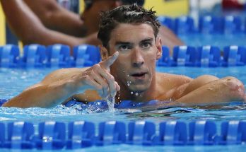 Michael Phelps was chosen as the US Flag Bearer