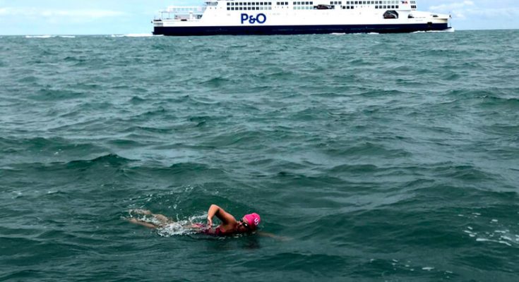 Vera Rivard of New Hampshire swims across the English Channel